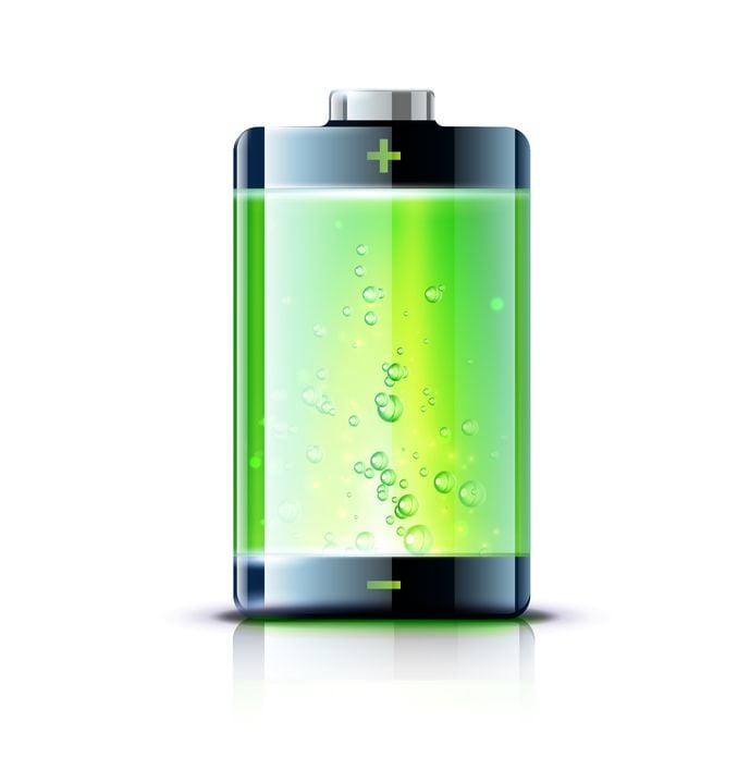 Green battery icon with bubbles, symbolizing full charge and energy efficiency. Perfect for power and technology themes.
