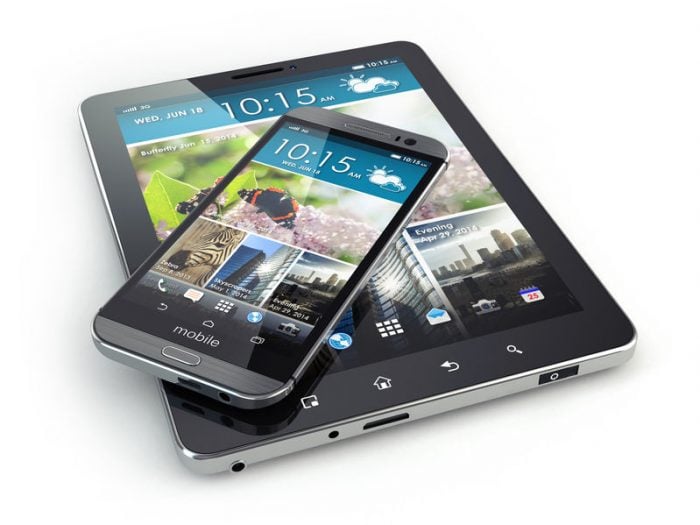 Smartphone and tablet with digital displays showcasing weather and wildlife images, depicting modern technology use.