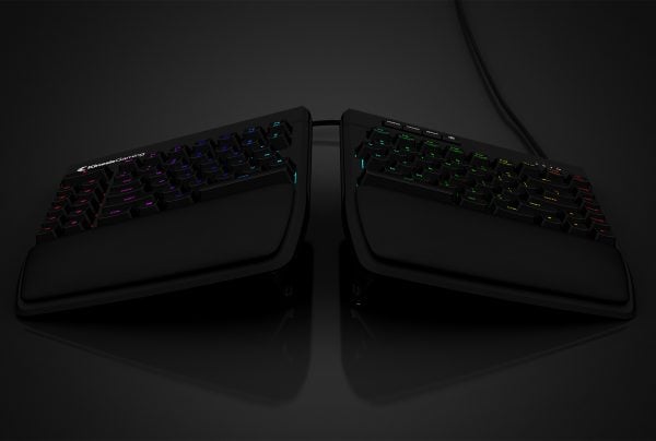 Ergonomic split keyboard with RGB backlit keys on a dark background, designed for comfortable typing and gaming.