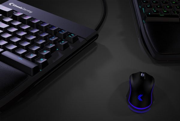 Gaming keyboard and mouse set on a dark surface with RGB lighting, enhancing an immersive gaming experience.