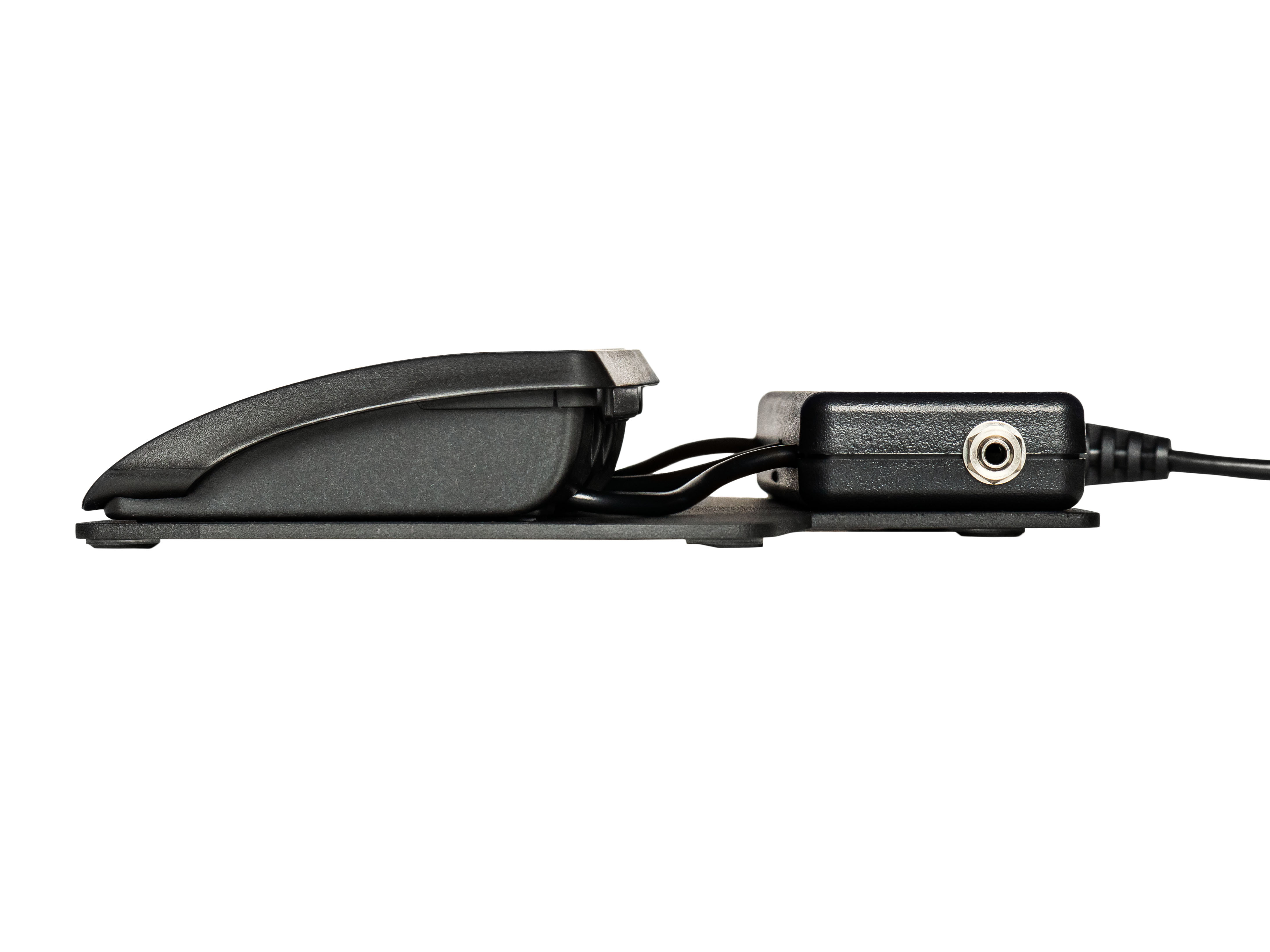 Side view of a black electronic foot switch pedal with a connector cable, ideal for hands-free device control.