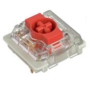 Mechanical keyboard switch with a red stem and black housing, ideal for gaming and typing.