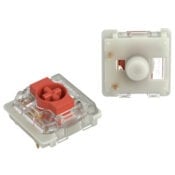 Close-up of a red mechanical keyboard switch, highlighting its design and components. Ideal for tactile typing experience.