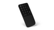Black wireless numeric keypad with ergonomic design, angled view on white background.