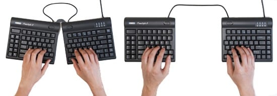 Hands typing on ergonomic split keyboards, showcasing customizable angles for ergonomic comfort and efficient typing.