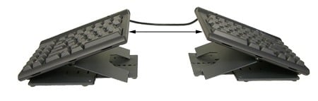 Ergonomic split keyboard with adjustable stands for improved typing comfort and reduced wrist strain.