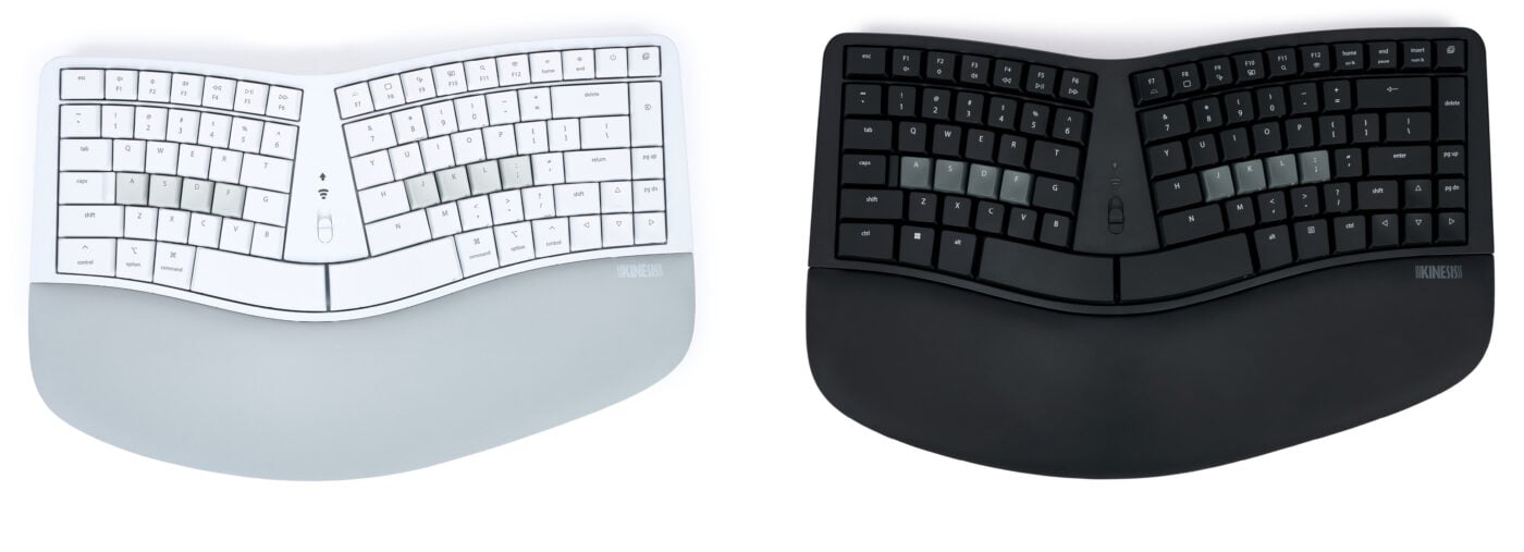 White and black ergonomic split keyboards with wrist rests for comfortable typing.