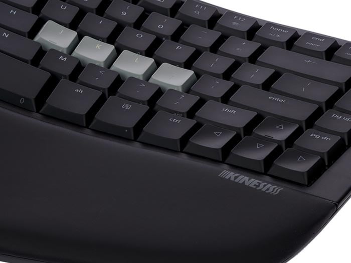 Ergonomic keyboard with contoured keys and wrist support, designed for comfortable typing and enhanced productivity.